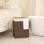 Washing and wheeled laundry basket with lid, 160L, three-section design, synthetic rattan appearance, suitable for bedroom storage.