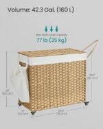 Woven oval laundry basket with handle, suitable for clothing and bedding storage. - Image 2